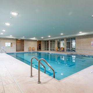 A spacious and inviting indoor swimming pool, perfect for relaxation and recreation.