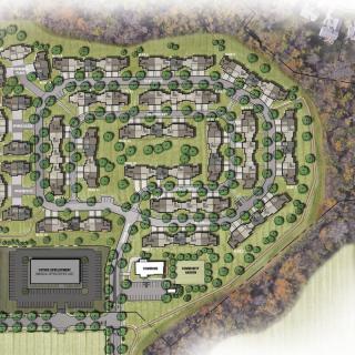 A detailed site plan of a residential development surrounded by greenery and natural landscape features.