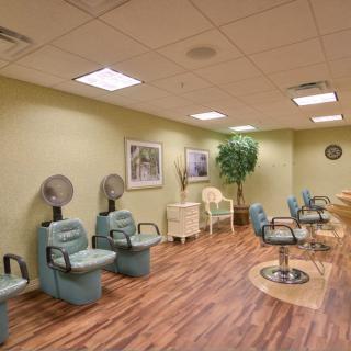 A cozy salon with vintage hair dryer chairs and a relaxing ambiance.