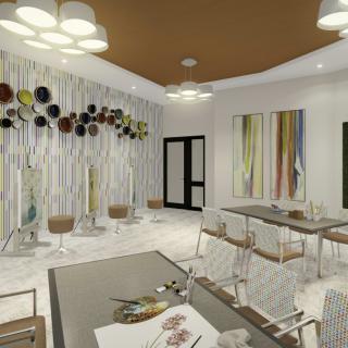 A modern dining area with contemporary art and stylish furniture.