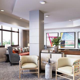 A modern lobby with comfortable seating and stylish decor.