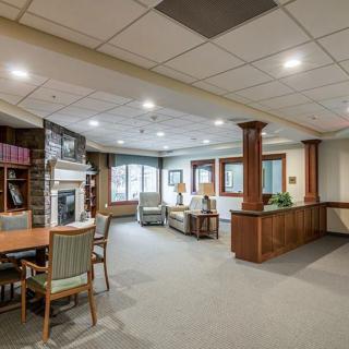 A spacious and elegantly designed lobby with comfortable seating and warm lighting.