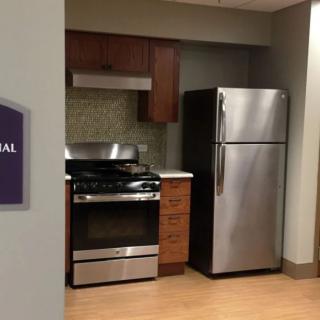 A modern kitchen setup with stainless steel appliances.