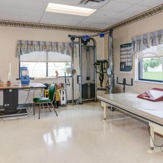 A well-equipped rehabilitation room designed for physical therapy.