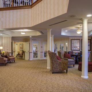A spacious lobby area with comfortable seating and elegant decor.