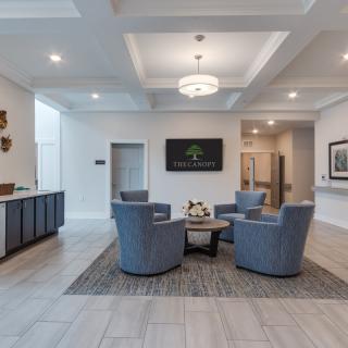 A modern lobby with comfortable seating and elegant decor.