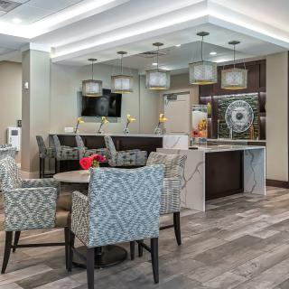 A modern lobby with comfortable seating and stylish lighting.