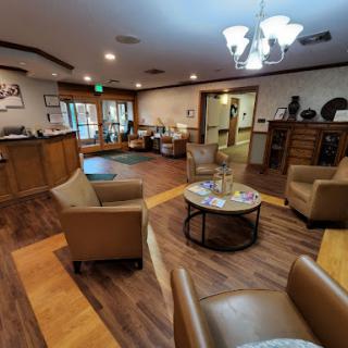 A welcoming reception area featuring comfortable seating and a modern design.