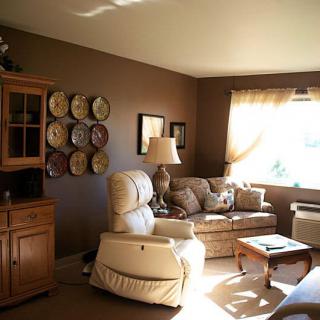 A cozy living room with comfortable seating and warm decor.
