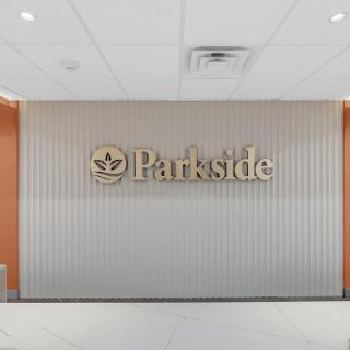 Welcoming reception area featuring the Parkside logo.