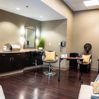 A modern and stylish hair salon interior designed for comfort and aesthetics.