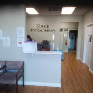 A welcoming reception area in a physical therapy clinic.