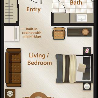 A floor plan of a studio apartment featuring a combined living/bedroom area, a small entryway, and a bathroom.