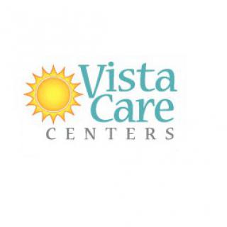 Logo of Vista Care Centers featuring a sun symbol.