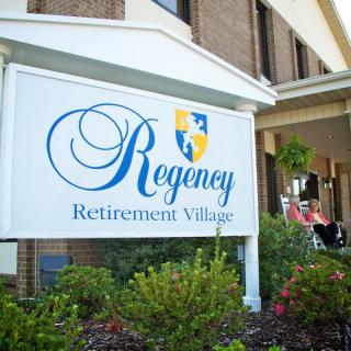 Entrance sign for Regency Retirement Village.