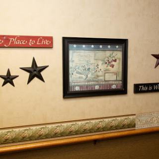 A cozy corner showcasing decorative elements including a map and star-shaped accents.