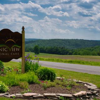 A beautiful scenic view showcasing the lush countryside and rolling hills.