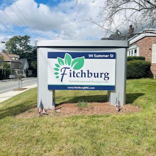 A welcoming sign for Fitchburg, indicating the city's name and location.