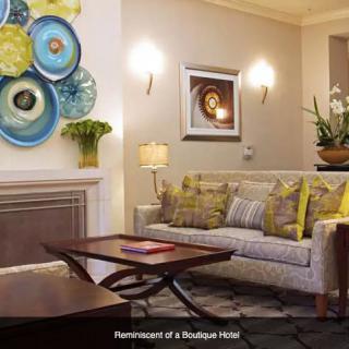 A modern living room with chic decor reminiscent of a boutique hotel.