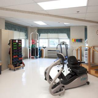 A well-equipped physical therapy room designed for rehabilitation and fitness activities.