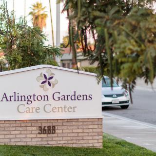 The entrance sign for Arlington Gardens Care Center.