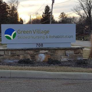 Welcome sign for Green Village Assisted Living & Rehabilitation.