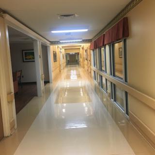 A well-lit and clean hallway in a medical facility.