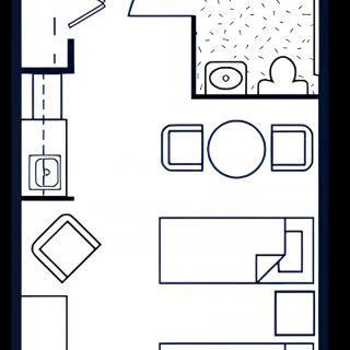 Studio apartment floor plan with furniture layout.