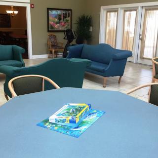 A cozy living room with comfortable seating and a coffee table.