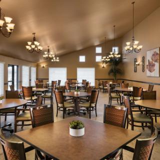 A spacious and inviting dining area, designed for comfort and ambiance.