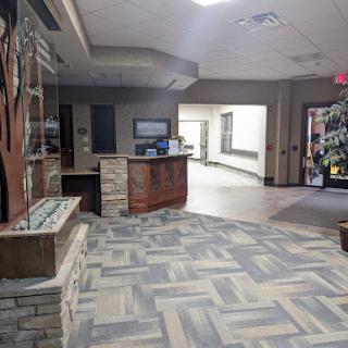 A modern reception area featuring stylish flooring and a welcoming ambiance.