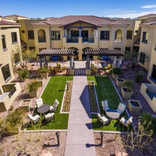 Aerial view of a landscaped courtyard with pathways and seating areas.