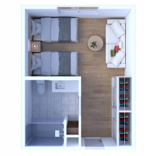 A modern interior layout featuring twin beds and a small living area with wood flooring.