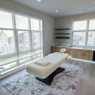 A serene and inviting massage room designed for relaxation and wellness.