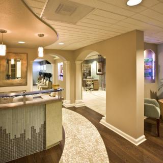 A modern reception area with stylish decor and comfortable seating.
