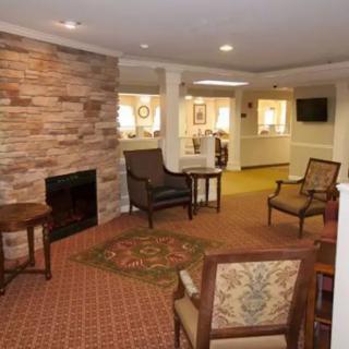 Cozy living room with a fireplace and comfortable seating.