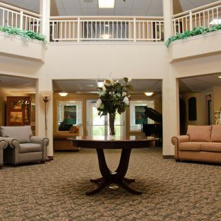 A spacious lobby area with comfortable seating and elegant decor.