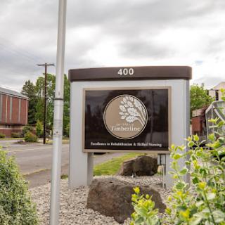 A business sign indicating the location of a firm specializing in architecture and engineering.