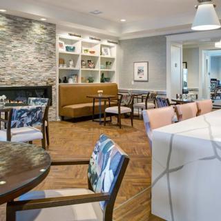 A modern dining area with comfortable seating and stylish decor.
