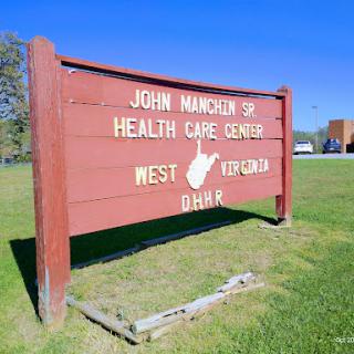 Sign for the John Manchin Health Care Center in West Virginia.