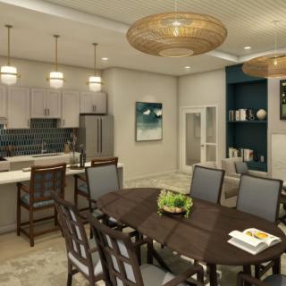 A modern open-concept kitchen and dining area with stylish wood furniture and pendant lighting.