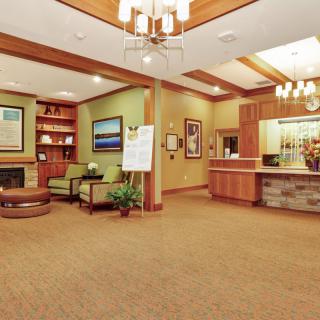 A welcoming lobby with comfortable seating and a reception desk.