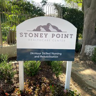 Sign for Stoney Point, a facility offering 24-hour skilled nursing and rehabilitation services.