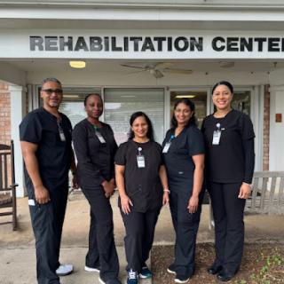 A dedicated team of healthcare professionals at the Rehabilitation Center.