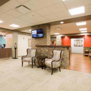 A modern lobby with comfortable seating and a welcoming reception area.
