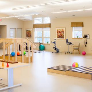 A well-equipped physical therapy room designed for rehabilitation exercises.