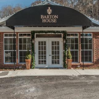 The exterior of Barton House, a restaurant with a welcoming entrance.