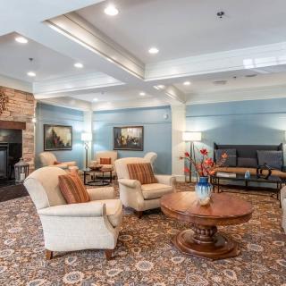 A cozy hotel lobby with comfortable seating and elegant decor.