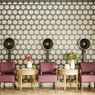Vintage salon with retro hair dryers and chic decor.