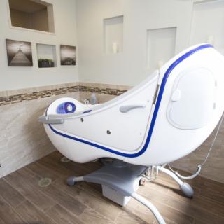 A modern hydrotherapy spa tub designed for relaxation and wellness in a serene setting.